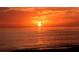 Enjoy the beautiful sunset as the horizon meets the water with a relaxing orange glow at 3276 Westford Ln, #117,, Sarasota, FL 34231