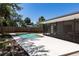 Backyard swimming pool and patio area with screened lanai attached at 3338 Roslyn Rd, Venice, FL 34293