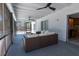 Covered and screened lanai with ceiling fans overlooking a swimming pool at 3338 Roslyn Rd, Venice, FL 34293
