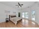 Spacious bedroom with hardwood floors and natural light at 3737 Bayou Louise Ln, Sarasota, FL 34242