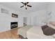 Bright bedroom with hardwood floors and a fireplace at 3737 Bayou Louise Ln, Sarasota, FL 34242
