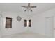 Large bedroom with windows, ceiling fan and closet for storage at 3737 Bayou Louise Ln, Sarasota, FL 34242