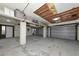 Spacious garage with an overhead storage area and room for multiple vehicles at 3737 Bayou Louise Ln, Sarasota, FL 34242