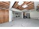Unfinished garage with multiple bays and unfinished ceiling at 3737 Bayou Louise Ln, Sarasota, FL 34242