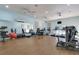 Gym featuring various exercise machines, free weights, and a wall mirror at 3802 Gulf Of Mexico Dr # A205, Longboat Key, FL 34228