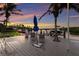 Waterfront dock offers seating and access to the water, creating a perfect spot to enjoy the peaceful ambiance at 4 Winslow Pl, Longboat Key, FL 34228