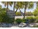 Restaurant and pub with outdoor seating, surrounded by lush landscaping and shade trees at 4 Winslow Pl, Longboat Key, FL 34228