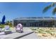Backyard features a pool, a dock, and a patio with lounge chairs for relaxing by the water at 4 Winslow Pl, Longboat Key, FL 34228
