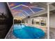 Inviting screened pool offers sunset views and seamless indoor-outdoor living with direct access to the home at 4 Winslow Pl, Longboat Key, FL 34228
