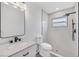 Modern bathroom with marble countertop vanity and luxurious walk-in shower at 4131 Oakhurst W Cir # 3133, Sarasota, FL 34233