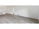 Spacious living room with luxury floors and an open floor plan at 4131 Oakhurst W Cir # 3133, Sarasota, FL 34233