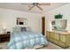 Bright bedroom with a ceiling fan, neutral color scheme, and carpet flooring for added comfort at 4165 66Th Street W Cir # H, Bradenton, FL 34209