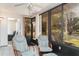 Relaxing patio with seating, a ceiling fan, and views of the surrounding landscape at 4165 66Th Street W Cir # H, Bradenton, FL 34209