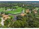 Beautiful aerial view of the golf course homes and the manicured greens at 4637 Willow Wood Cir # 44, Sarasota, FL 34241