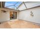 Screened lanai with a brick floor offers an inviting transition to the outdoors at 4637 Willow Wood Cir # 44, Sarasota, FL 34241