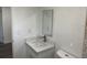 Bathroom features a new sink, modern faucet, and an updated mirror at 4740 Garcia Ave, Sarasota, FL 34233