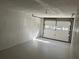 Clean and spacious garage with a functional overhead door at 4740 Garcia Ave, Sarasota, FL 34233