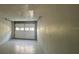 Bright and spacious garage with an overhead door at 4740 Garcia Ave, Sarasota, FL 34233