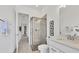 Clean bathroom featuring a glass-enclosed shower, vanity with sink, and neutral color palette at 4925 Coastal Days Ln, Bradenton, FL 34211
