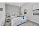 Inviting bedroom with a large bed, soft lighting, and stylish decor elements at 4925 Coastal Days Ln, Bradenton, FL 34211