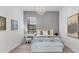 Charming bedroom with a chandelier, study desk, and cozy decor for a relaxing space at 4925 Coastal Days Ln, Bradenton, FL 34211