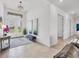 Bright and airy foyer featuring elegant decor and a clear view of the home's stylish design at 4925 Coastal Days Ln, Bradenton, FL 34211