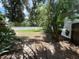 View of the backyard featuring a privacy fence and lush tropical landscaping at 5032 81St Avenue E Ter, Sarasota, FL 34243