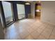 Charming dining area with tile flooring, a modern light fixture, and plenty of natural light at 5032 81St Avenue E Ter, Sarasota, FL 34243