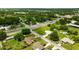 Aerial view of neighborhood homes near lush greenery and a highway at 5213 20Th Street E Ct, Bradenton, FL 34203