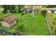 Spacious backyard with a storage shed and chain link fence at 5213 20Th Street E Ct, Bradenton, FL 34203