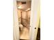 Bathroom featuring updated shower with glass doors, tiled floors and modern toilet at 5213 20Th Street E Ct, Bradenton, FL 34203