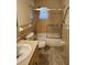 Bathroom featuring a shower-tub combo with tile surround and neutral-toned walls at 5213 20Th Street E Ct, Bradenton, FL 34203