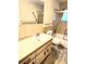 Neutral bathroom featuring a shower/tub combo and single sink at 5213 20Th Street E Ct, Bradenton, FL 34203