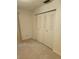 Bedroom with a closet running the length of the wall and neutral-toned walls at 5213 20Th Street E Ct, Bradenton, FL 34203