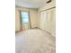 Spacious bedroom with neutral paint, carpet, double closet and natural light at 5213 20Th Street E Ct, Bradenton, FL 34203