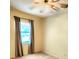 Cozy bedroom with ceiling fan and natural light at 5213 20Th Street E Ct, Bradenton, FL 34203
