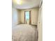Neutral bedroom with natural light, a closet and carpet flooring at 5213 20Th Street E Ct, Bradenton, FL 34203