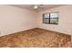 Bedroom with neutral walls, and a window bringing in natural light at 5213 20Th Street E Ct, Bradenton, FL 34203