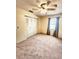 Comfortable bedroom features a closet with mirrored doors and neutral carpet at 5213 20Th Street E Ct, Bradenton, FL 34203