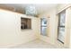 Bright dining space featuring a pass-through to the kitchen at 5213 20Th Street E Ct, Bradenton, FL 34203