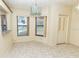 Cozy dining area with a chandelier and large windows at 5213 20Th Street E Ct, Bradenton, FL 34203