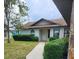 Charming home with manicured landscaping, a walkway, and lovely curb appeal at 5213 20Th Street E Ct, Bradenton, FL 34203