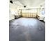 Spacious two-car garage with built-in storage shelves at 5213 20Th Street E Ct, Bradenton, FL 34203