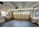 Large garage with built in shelving and space for two vehicles at 5213 20Th Street E Ct, Bradenton, FL 34203