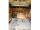 Untidy garage offering storage space and access to the outdoors at 5213 20Th Street E Ct, Bradenton, FL 34203
