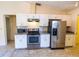 Efficient kitchen featuring white cabinets and stainless steel appliances at 5213 20Th Street E Ct, Bradenton, FL 34203