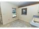 Kitchen area with a window and pass-through to the dining room at 5213 20Th Street E Ct, Bradenton, FL 34203