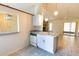 Kitchen with dishwasher, double sink, and breakfast bar at 5213 20Th Street E Ct, Bradenton, FL 34203