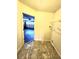Convenient laundry room with storage shelves and access to the garage at 5213 20Th Street E Ct, Bradenton, FL 34203