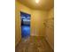 Laundry room with utility shelving and access to the garage at 5213 20Th Street E Ct, Bradenton, FL 34203